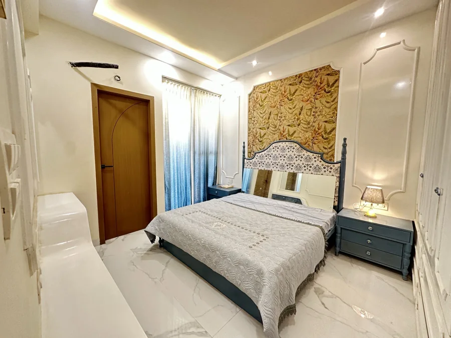 Kalyan EVA actual 3 BHK flat · Bedroom with feature wall